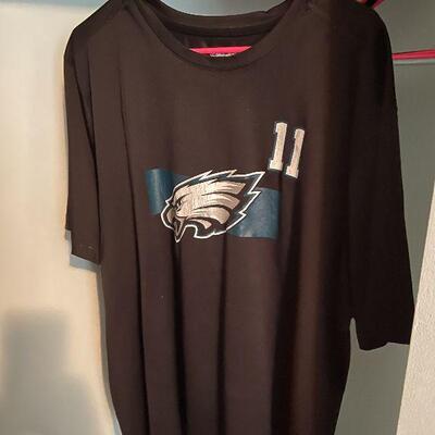 B12: Phillies and Eagles Shirts