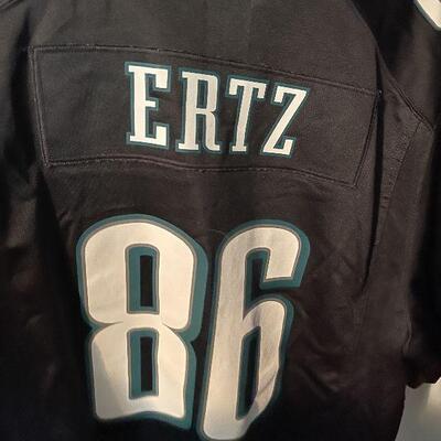 B12: Phillies and Eagles Shirts