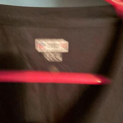 B12: Phillies and Eagles Shirts