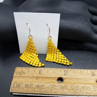 Lot #25 - Yellow metal dangley earrings