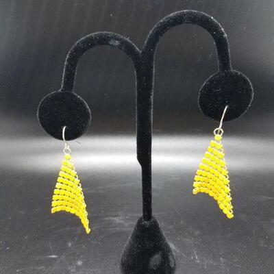 Lot #25 - Yellow metal dangley earrings