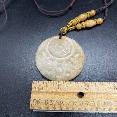 Lot #28 - Awesome carved jade medallion necklace