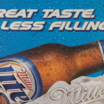 " Metal/  Miller Lite Beer sign 46in x 33 in. ."