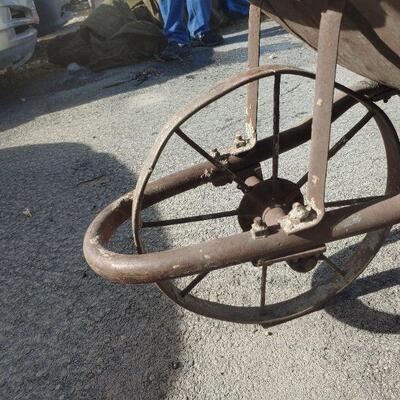 Antique all metal wheelbarrow