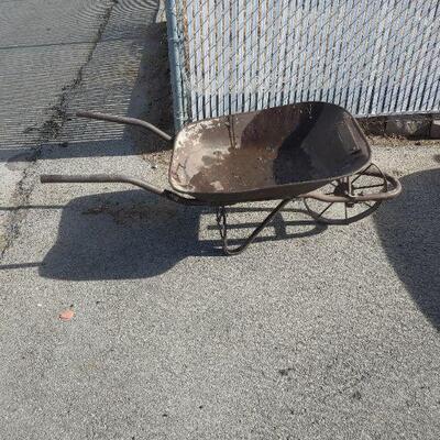 Antique all metal wheelbarrow