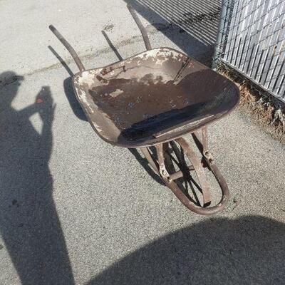 Antique all metal wheelbarrow