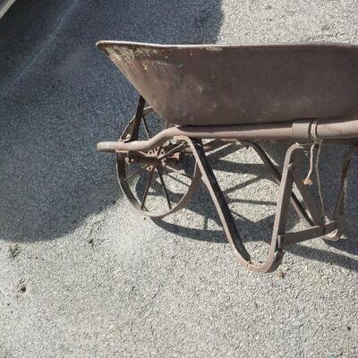 Antique all metal wheelbarrow