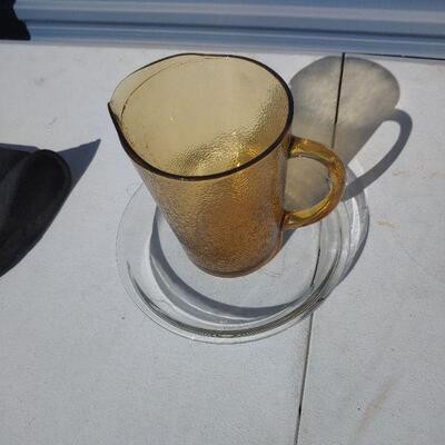 Glass pitcher and plate