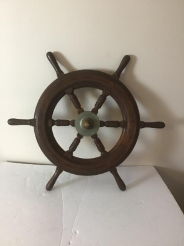 A - 542 Antique captains wheel with brass center | EstateSales.org