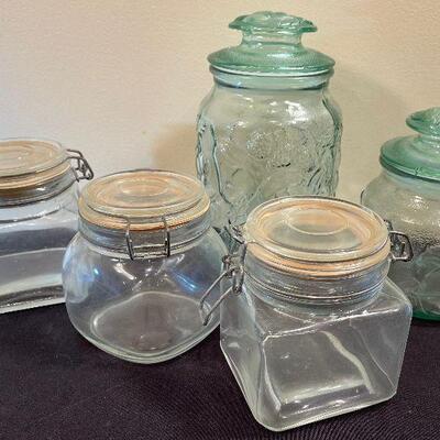 #83 5 Glass Kitchen Jars with lids.