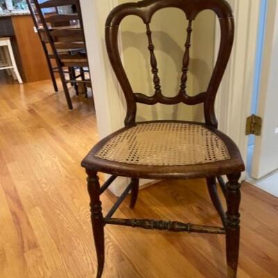 Beautiful antique birch wood with cane seat