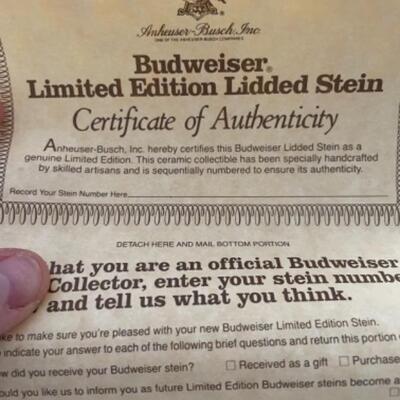 Budweiser beer stein (paperwork inside)