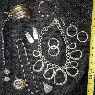 Costume Jewelry Lot (#10) 12 items  - 3 Necklaces, 4 Bracelets (one includes skulls),  1 pendant, 4 pr of Earrings