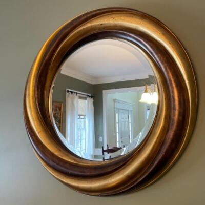 Beautiful gold gilded round mirror