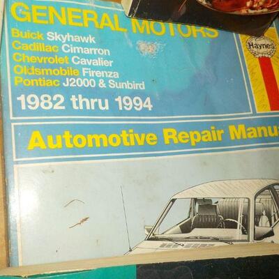Vintage auto repairs books and 2 cook books of Chinese food.