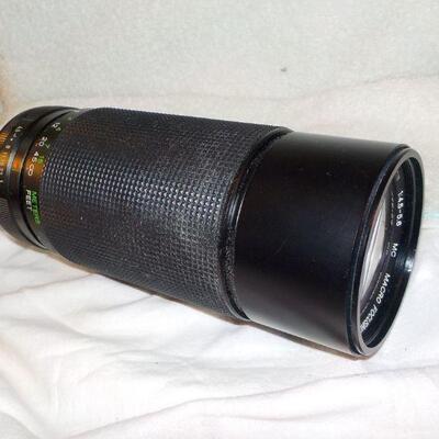 " Telephoto Lens / Macro Focusing zoom."
