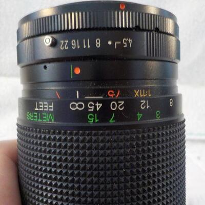 " Telephoto Lens / Macro Focusing zoom."