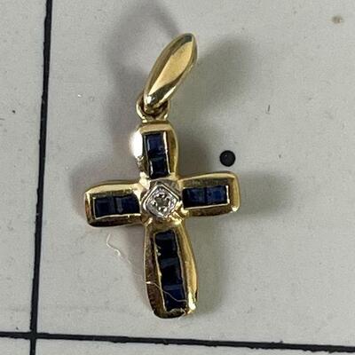 #177 10K Gold Cross with tiny Diamond and Blue Sapphire .8 grams 