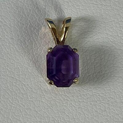 #178 14 K Amethyst Pendant .6 g