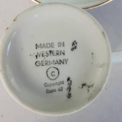 Two Demitasse Cup and Saucers