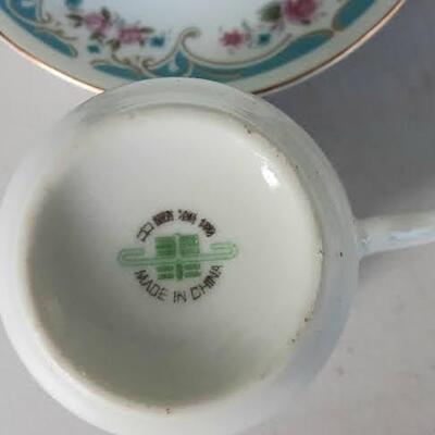 Two Demitasse Cup and Saucers