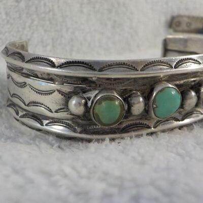 " Navaho hand made Coin silver w/ torques Braclet."