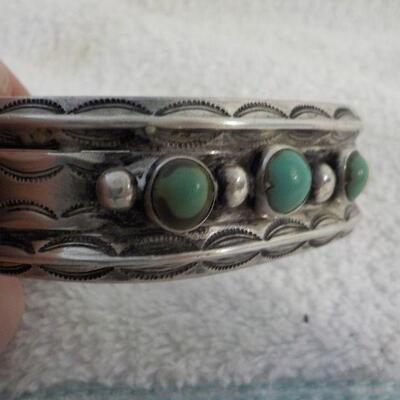 " Navaho hand made Coin silver w/ torques Braclet."