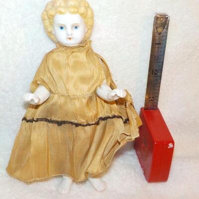" Porcelain Doll late 1800's with original clothes".