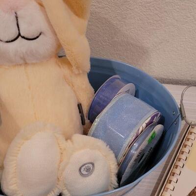Lot 40: New Baby Book, Ribbon, Patricia Reach Musical Ornament, Peek-a-Boo Bunny and vintage Peter Rabbit Tin
