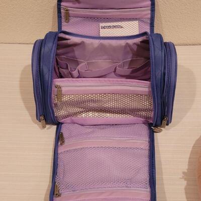 Lot 80: New Travel Toiletry Bag and Neck Pillow