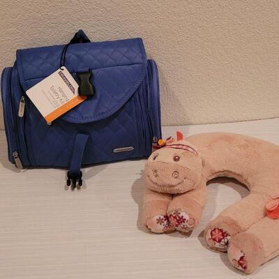 Lot 80: New Travel Toiletry Bag and Neck Pillow
