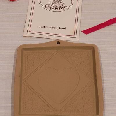 Lot 97: (3) Brown Bag Cookie Art Molds