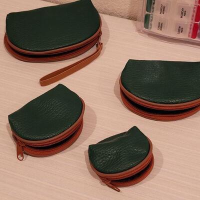 Lot 134: New Nesting Zipper Pouches and Pill Dispenser 