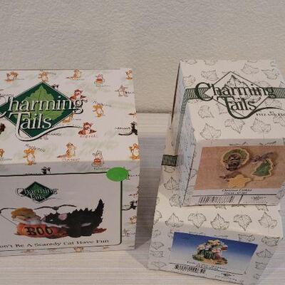 Lot 194: Assortment of Vintage NEW Charming Tails Collectibles