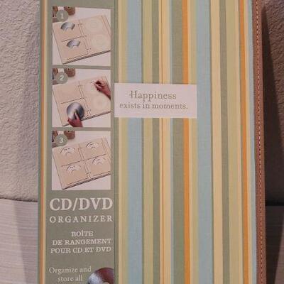 Lot 204: (3) New CD/DVD Designer Organizer Biders