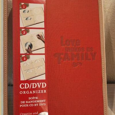 Lot 204: (3) New CD/DVD Designer Organizer Biders