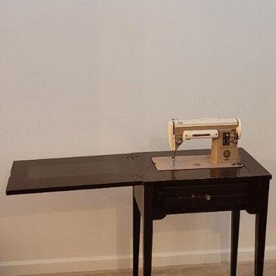 Lot 221: Vintage SINGER 301A Sewing Machine w/ Cabinet