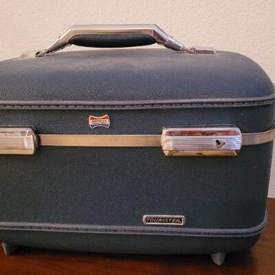 Lot 232: Vintage Mid Century Modern Unused AMERICAN TOURISTER Carryon Hard Case w/ Key