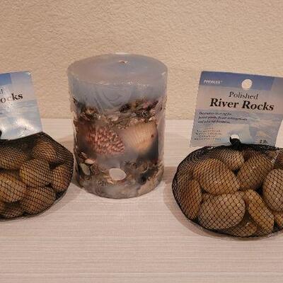 Lot 249: (2) New Bags of River Rocks and New Seashell Candle  