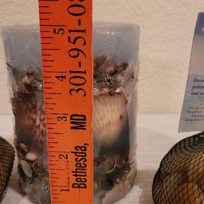 Lot 249: (2) New Bags of River Rocks and New Seashell Candle  