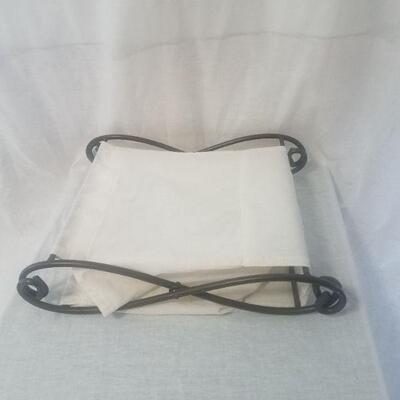 Lot #68 - Folding Wrought Iron and cotton magazine holder