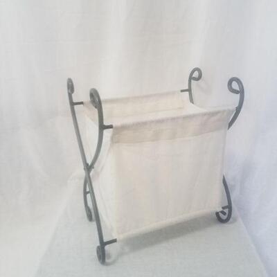 Lot #68 - Folding Wrought Iron and cotton magazine holder