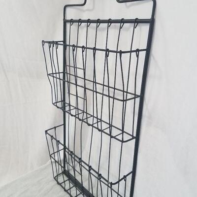 Lot #79 - Metal magazine rack