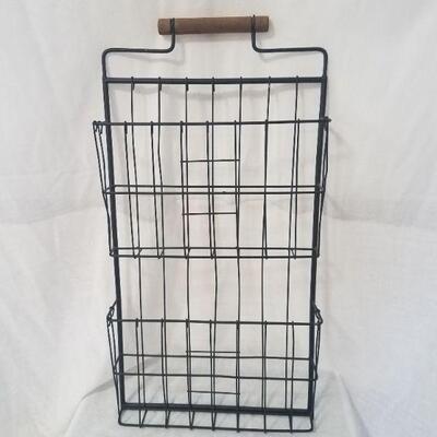 Lot #79 - Metal magazine rack