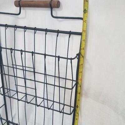 Lot #79 - Metal magazine rack