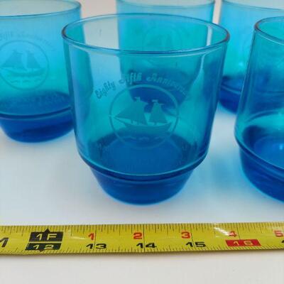 TURQUOISE COLORED COMMERATIVE GLASSES 
