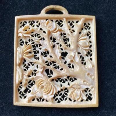 217 Hand carved bone pendant 