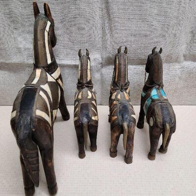 Set of 4 vintage, hand carved folk art horses