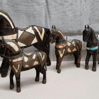 Set of 4 vintage, hand carved folk art horses