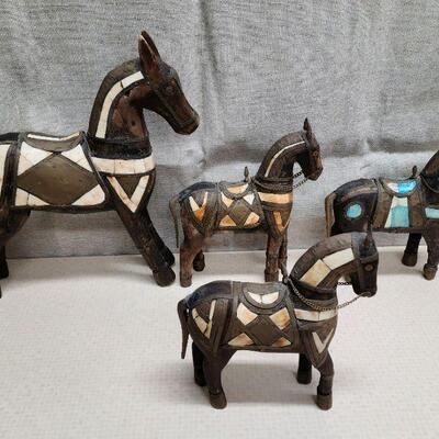 Set of 4 vintage, hand carved folk art horses